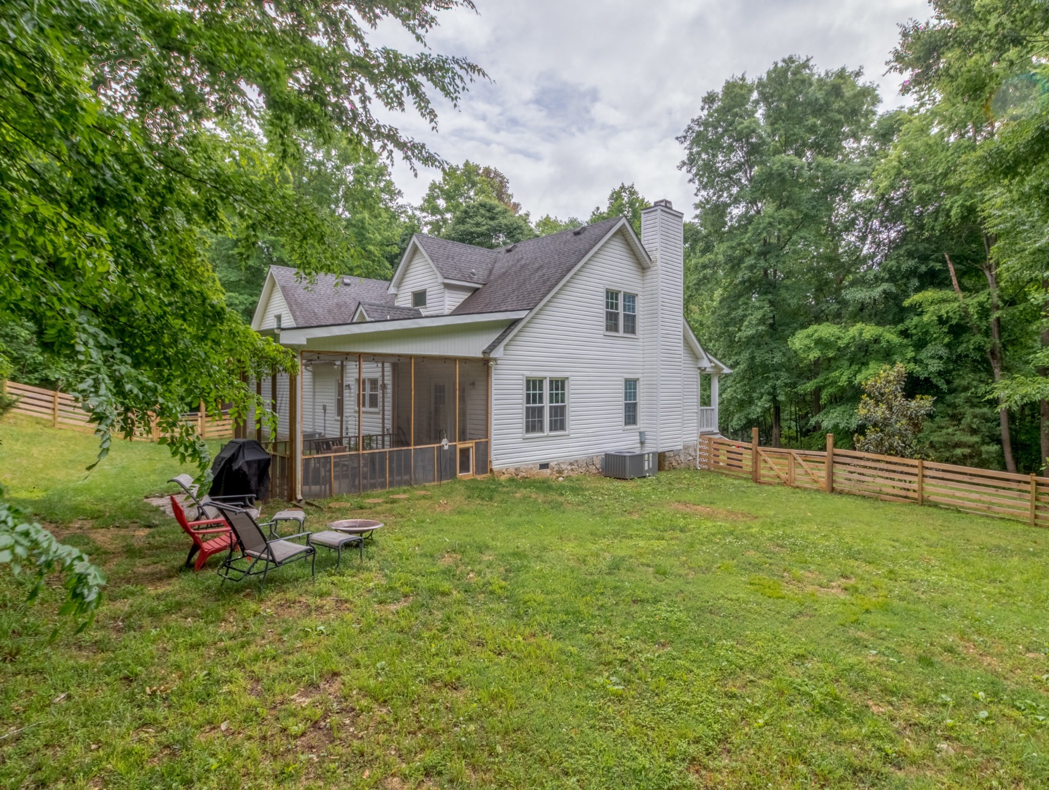 491 Harper Road Clarksville, TN 37043 - Photo 26 of 33 a view of a house with a yard and sitting area