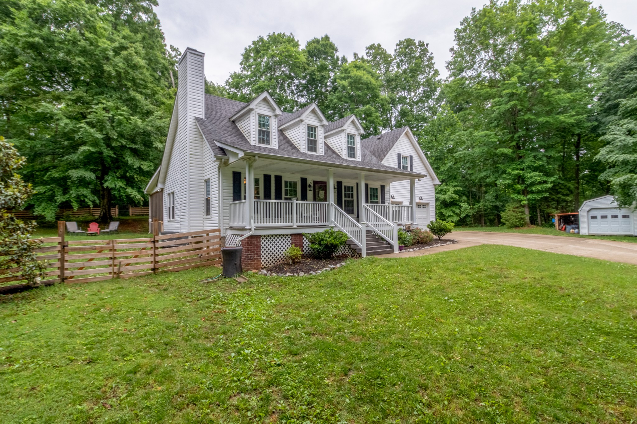 491 Harper Road Clarksville, TN 37043 - Photo 33 of 33 a house that has tree in front of it
