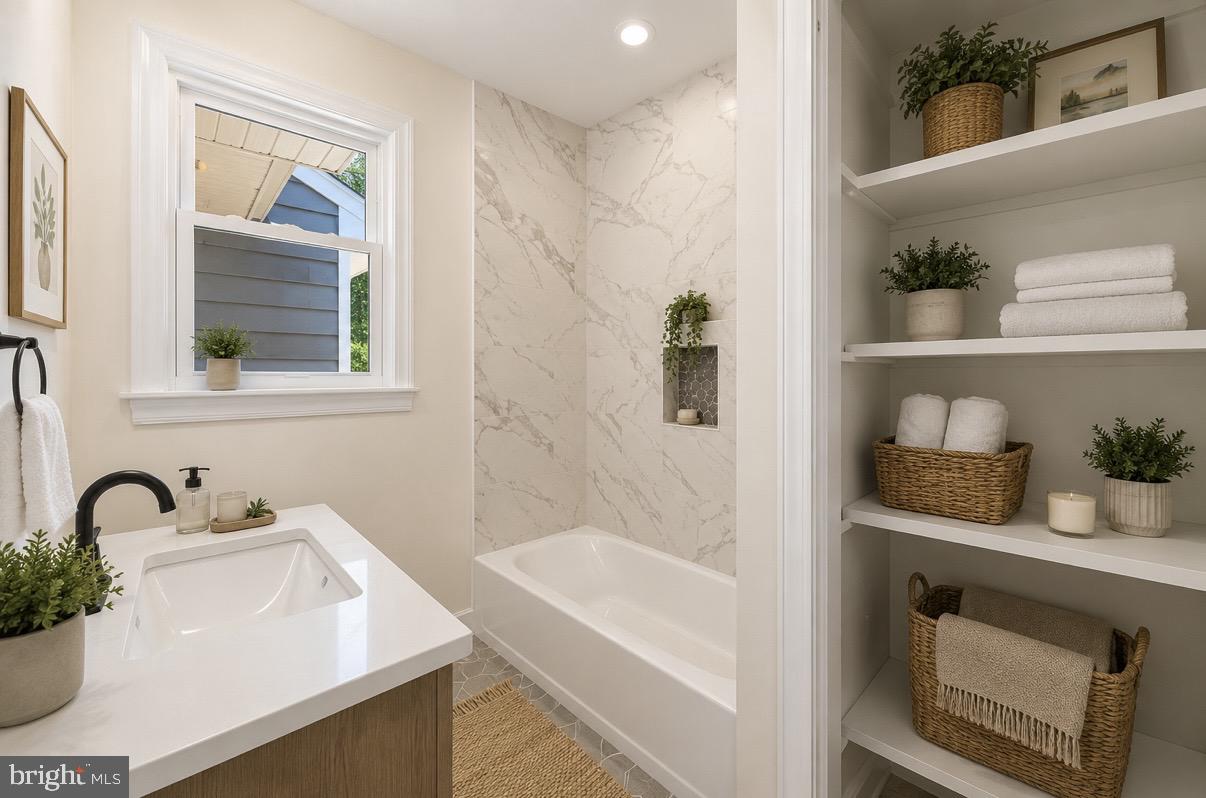 12 Oak Street Cambridge, MD 21613 - Photo 4 of 30 Serene bathroom with modern elegance.