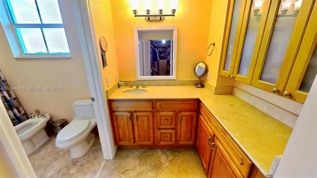 a bed room with a bed and a window