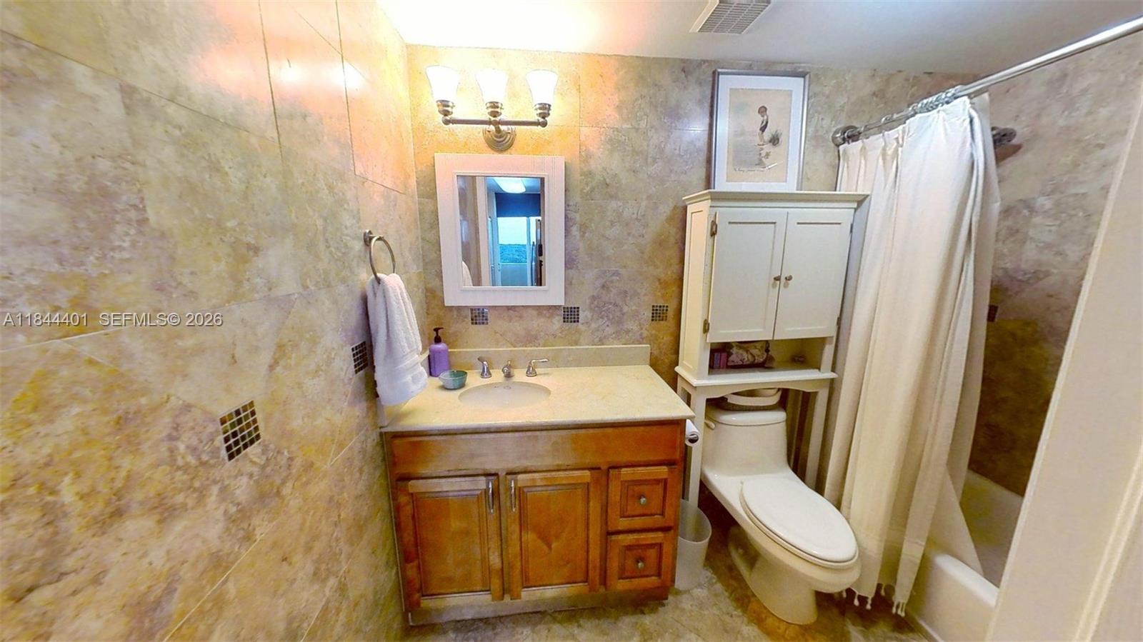 2425 Southwest 27th Avenue, Unit 701 Miami, FL 33145 - Photo 37 of 49 2nd Bathroom