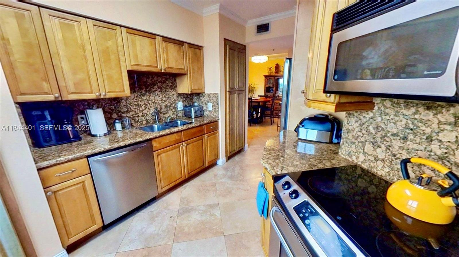 2425 Southwest 27th Avenue, Unit 701 Miami, FL 33145 - Photo 37 of 57 Stainless Steel Appliances