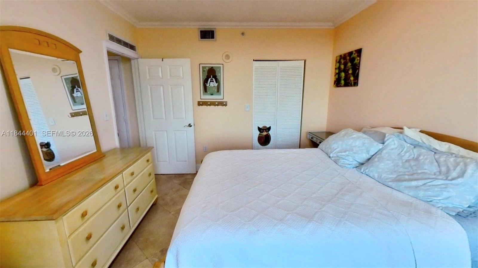 2425 Southwest 27th Avenue, Unit 701 Miami, FL 33145 - Photo 41 of 49 2nd Bedroom With Walk-In Closet