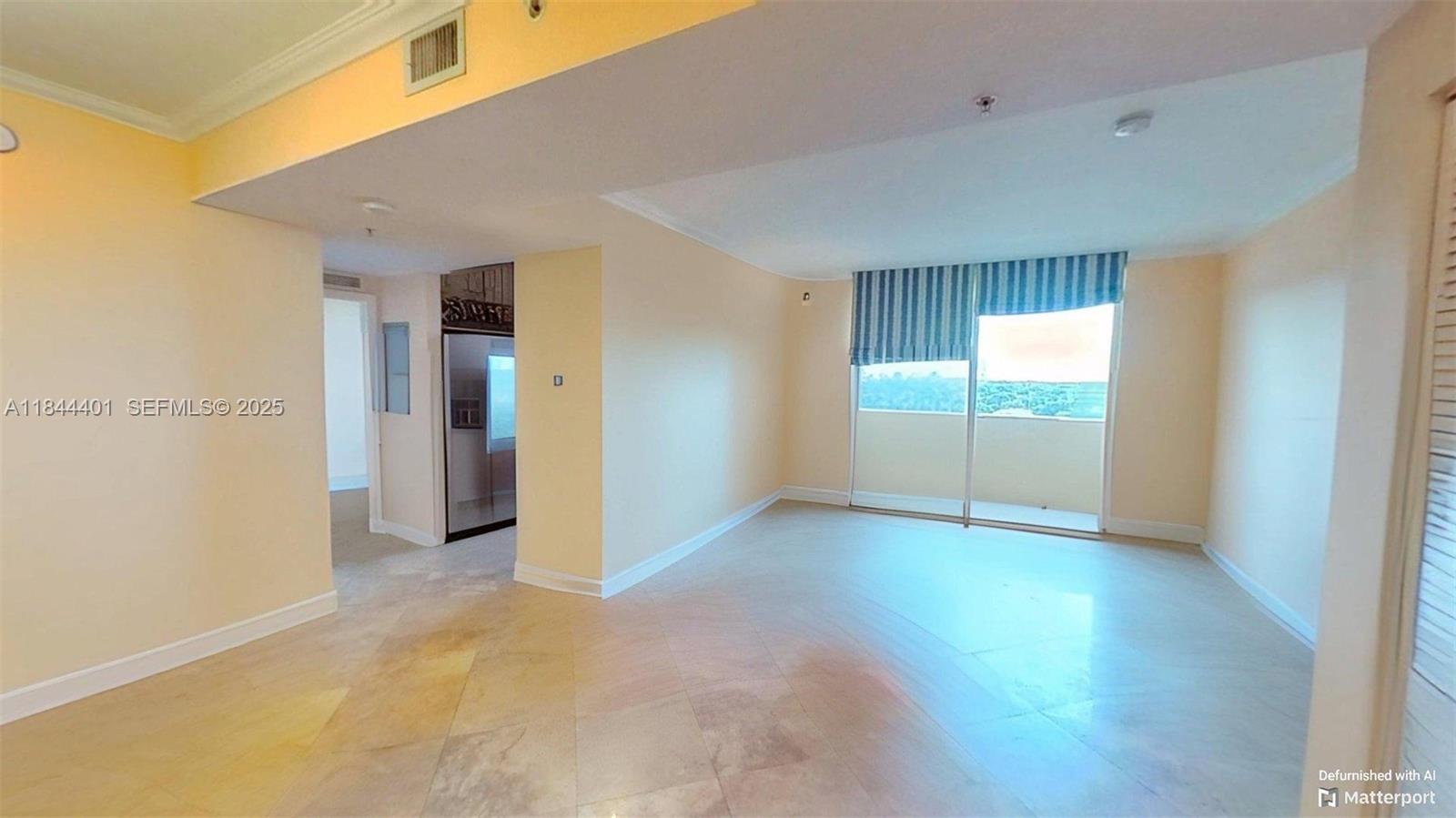 2425 Southwest 27th Avenue, Unit 701 Miami, FL 33145 - Photo 5 of 57 De-Furnished View of Living/Dining Areas