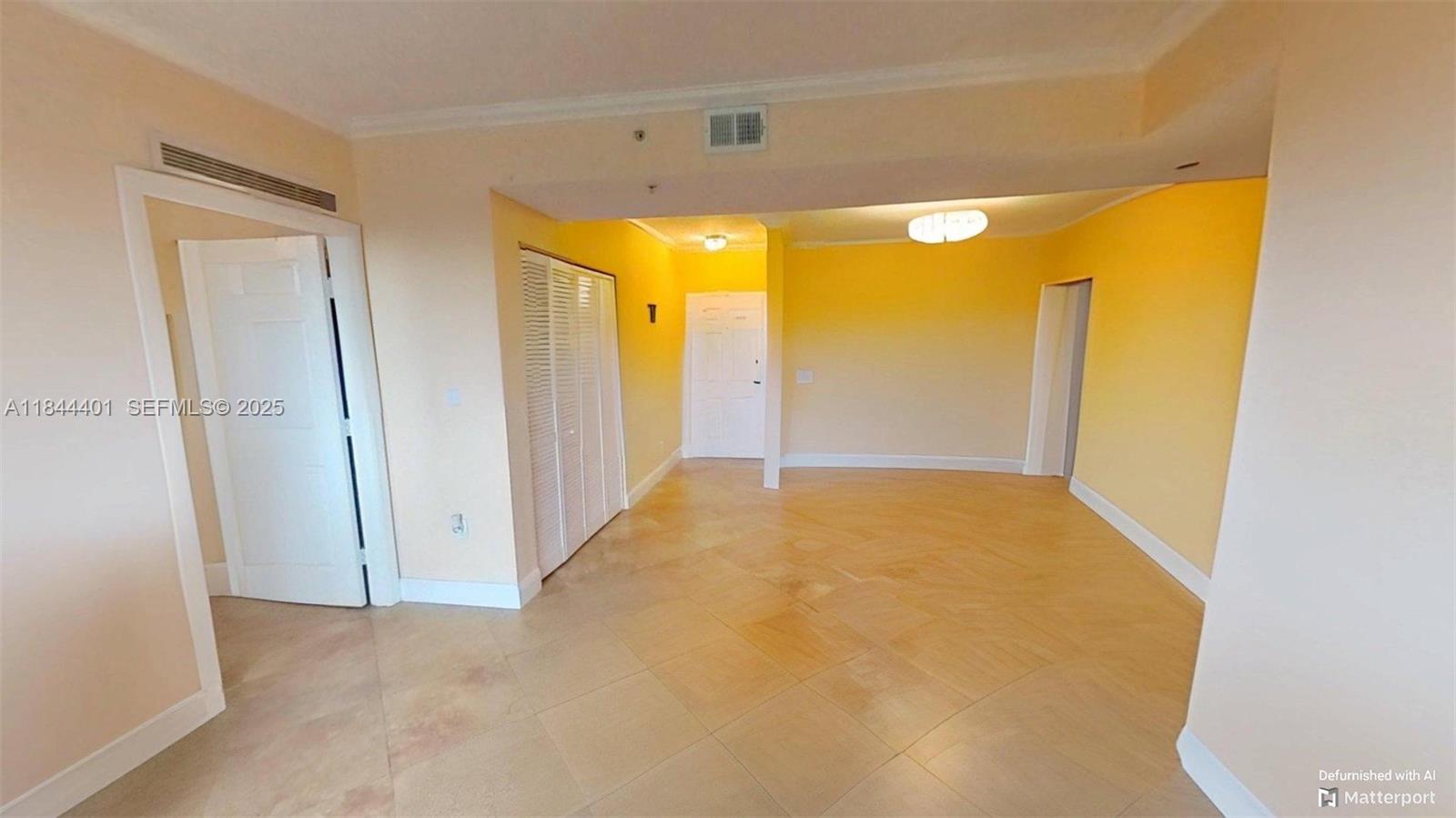 2425 Southwest 27th Avenue, Unit 701 Miami, FL 33145 - Photo 7 of 57 a view of an empty room