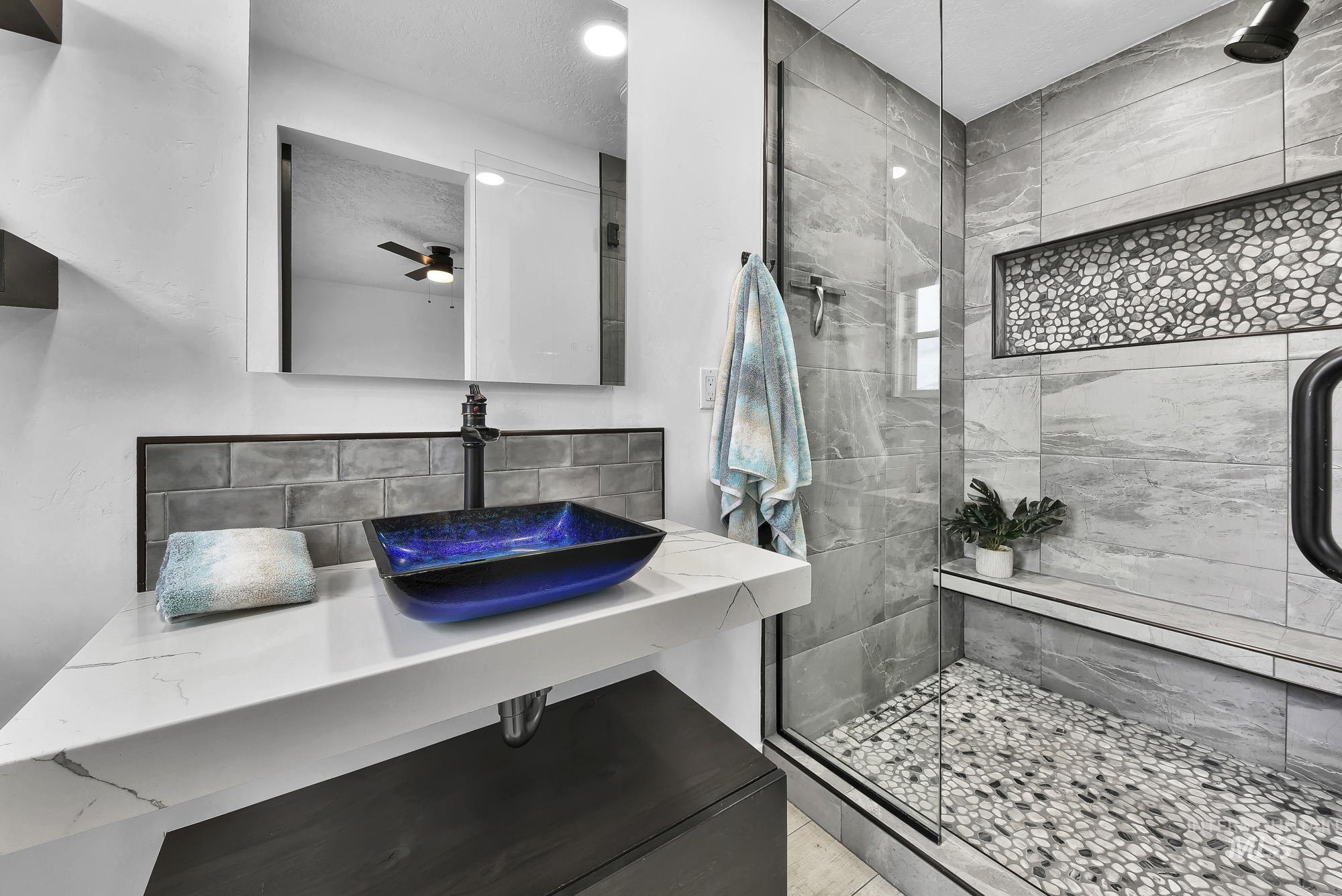 3630 Beverly Street Boise, ID 83709 - Photo 18 of 50 Full bathroom with a shower stall, vanity, tasteful backsplash, and ceiling fan