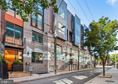 a view of a building along the street