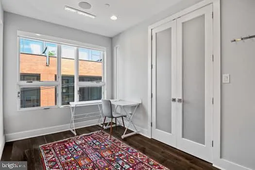 a room that has a rug and a chair in it