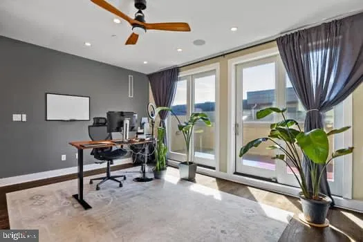 a workspace with furniture and a window