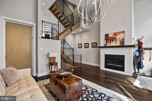 1332 Kater Street Philadelphia, PA 19147 - Photo 3 of 19 a living room with furniture a fireplace and a flat screen tv