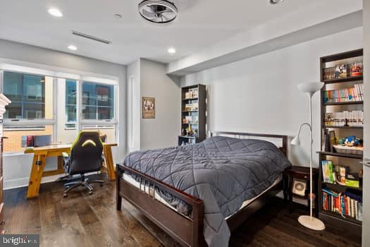 1332 Kater Street Philadelphia, PA 19147 - Photo 7 of 19 a bedroom with a bed and a chair