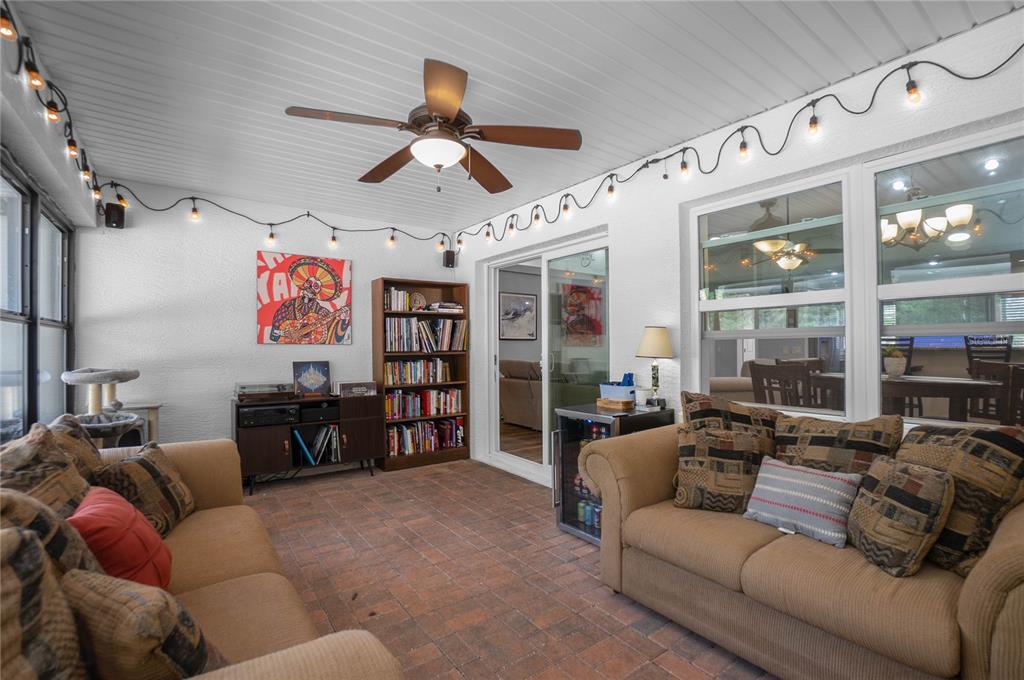 5466 West Tortuga Loop Lecanto, FL 34461 - Photo 30 of 41 a living room with furniture and a flat screen tv