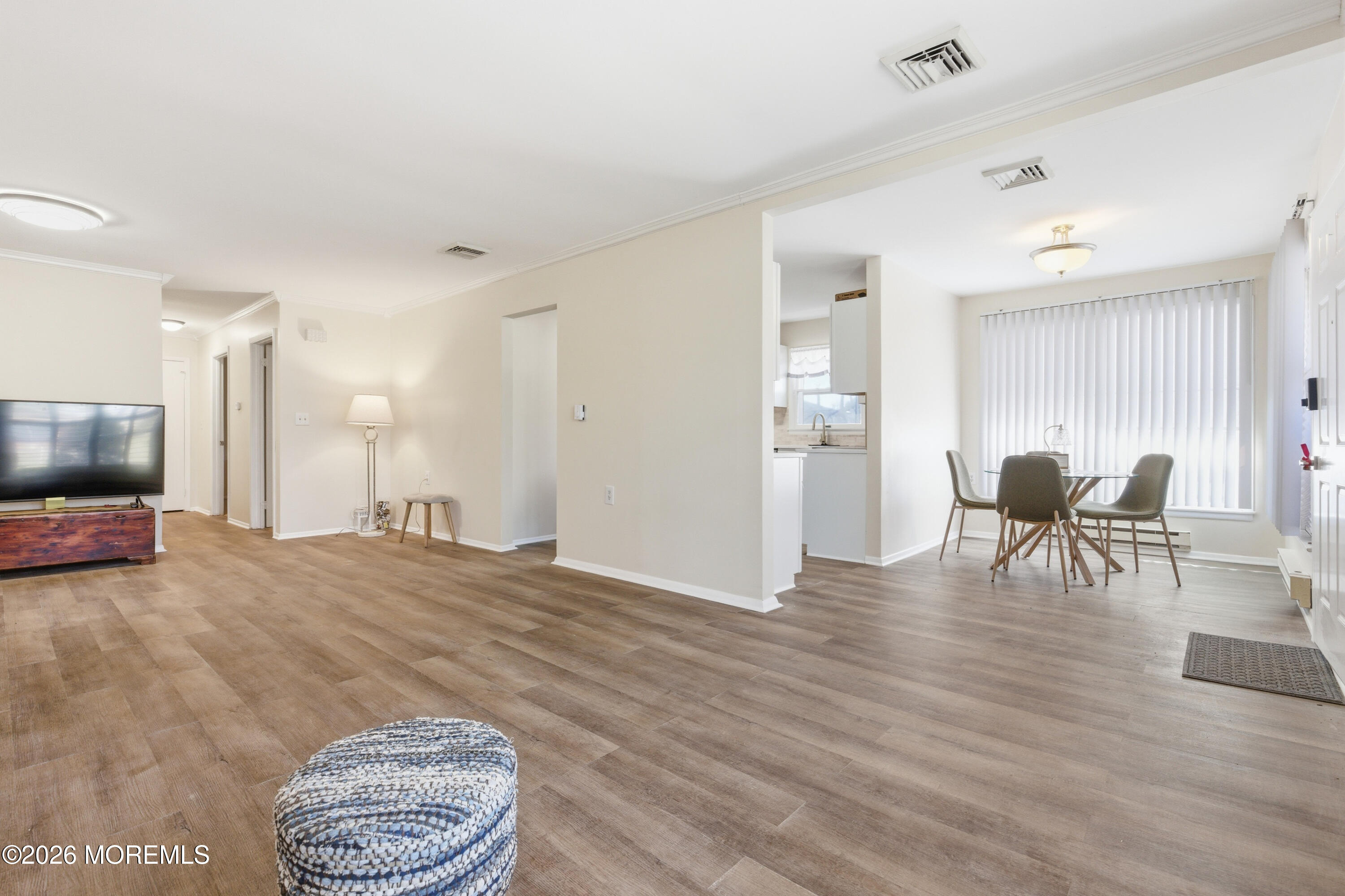 43 A Magnolia Road Manahawkin, NJ 08050 - Photo 11 of 18 a living room with furniture and a flat screen tv