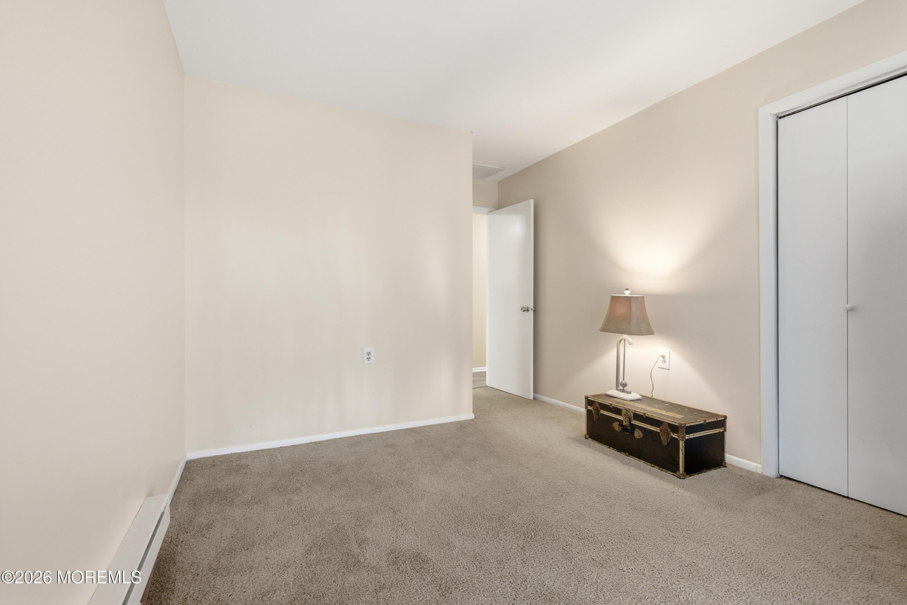 43 A Magnolia Road Manahawkin, NJ 08050 - Photo 13 of 18 a room with a mirror