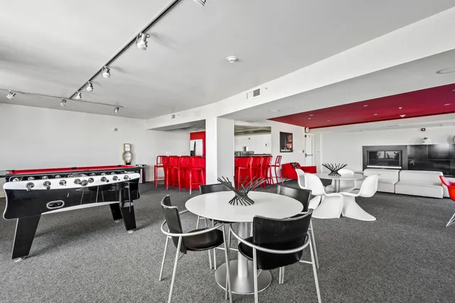 an aerial view of a city with lake