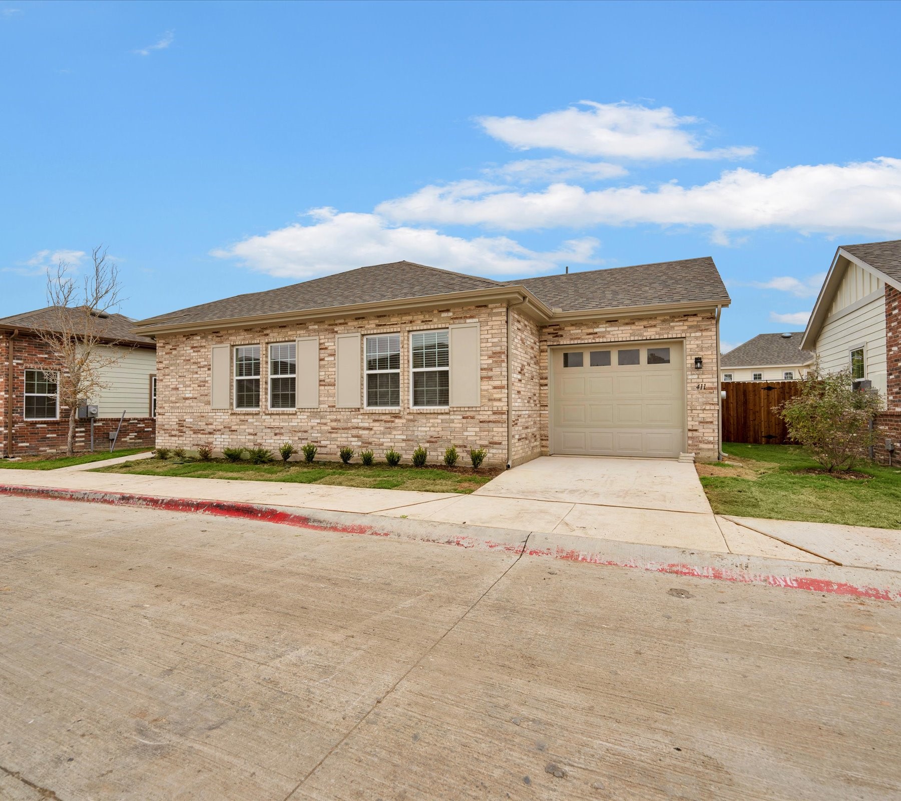 2709-602 Rockhill Road McKinney, TX 75072 - Photo 1 of 19 front view of a house with a street