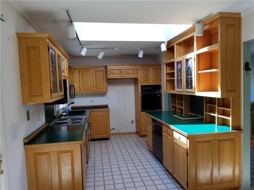 597 Wiswell Road Holden, ME 04429 - Photo 9 of 32 kitchen with skylight