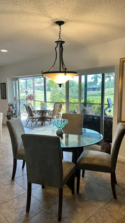 a room with furniture and a large window
