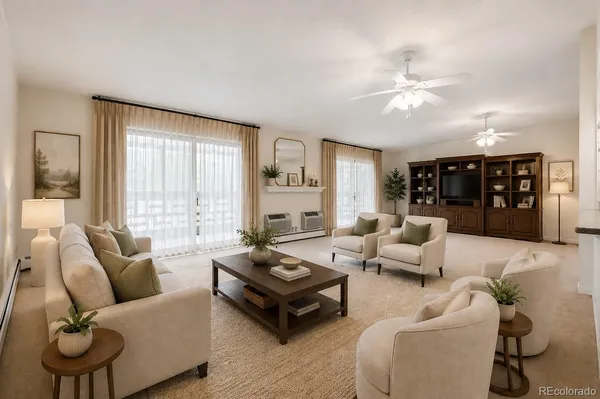 a living room with furniture and a large window