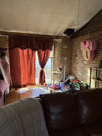 a bed room with a bed and a window