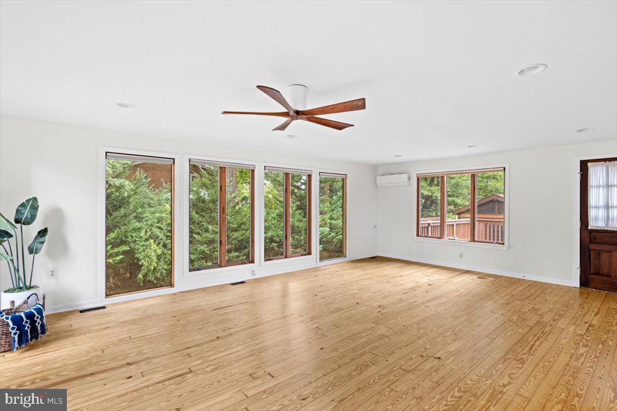 8403 Aubrey Drive Manassas, VA 20111 - Photo 14 of 30 Family room with remote control blinds