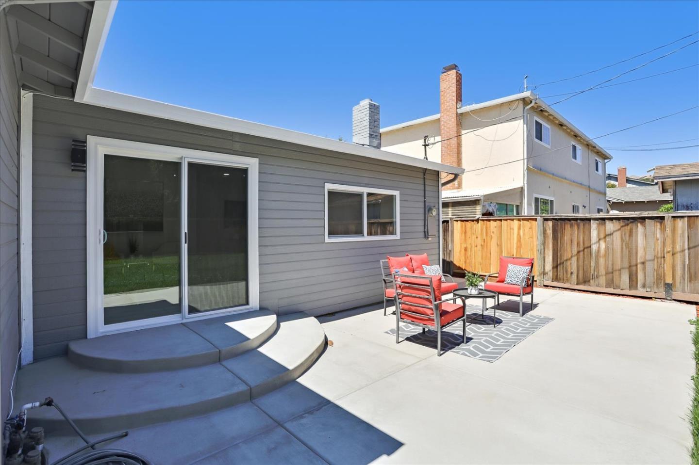 182 Rose Drive Milpitas, CA 95035 - Photo 4 of 8 a backyard of a house with seating space