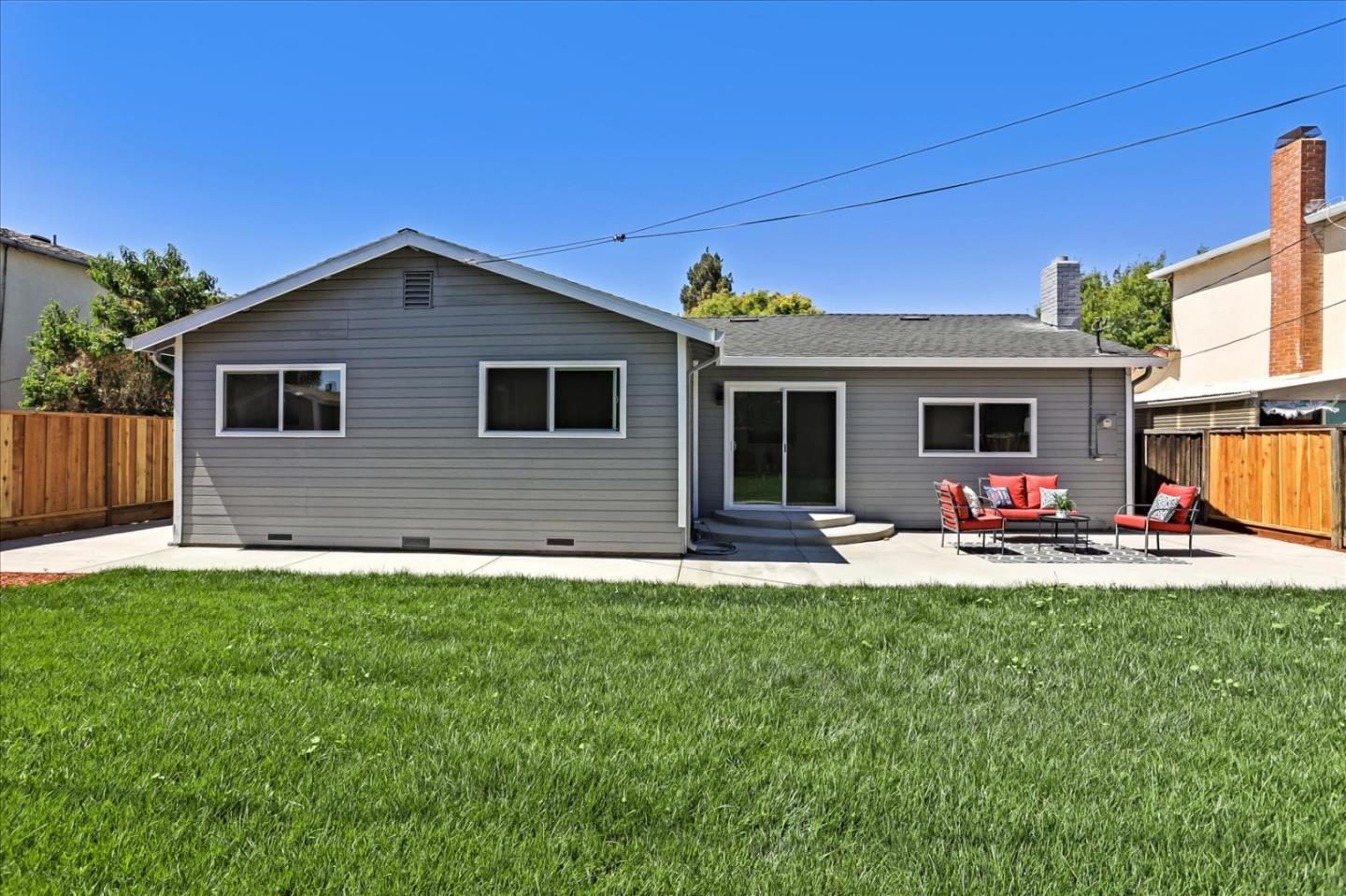 182 Rose Drive Milpitas, CA 95035 - Photo 5 of 8 a view of a house with a yard and sitting area