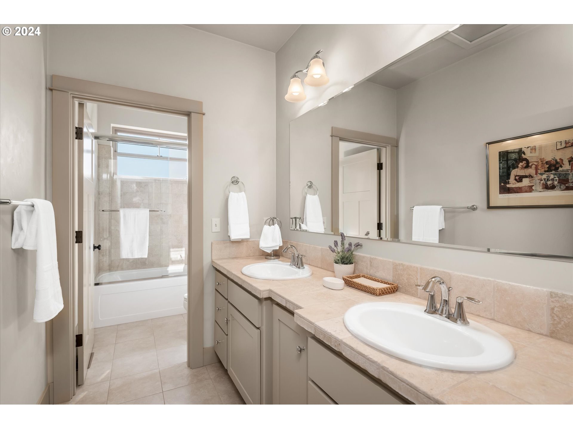6019 Graystone Loop Springfield, OR 97478 - Photo 21 of 46 a bathroom with a sink a toilet and a mirror