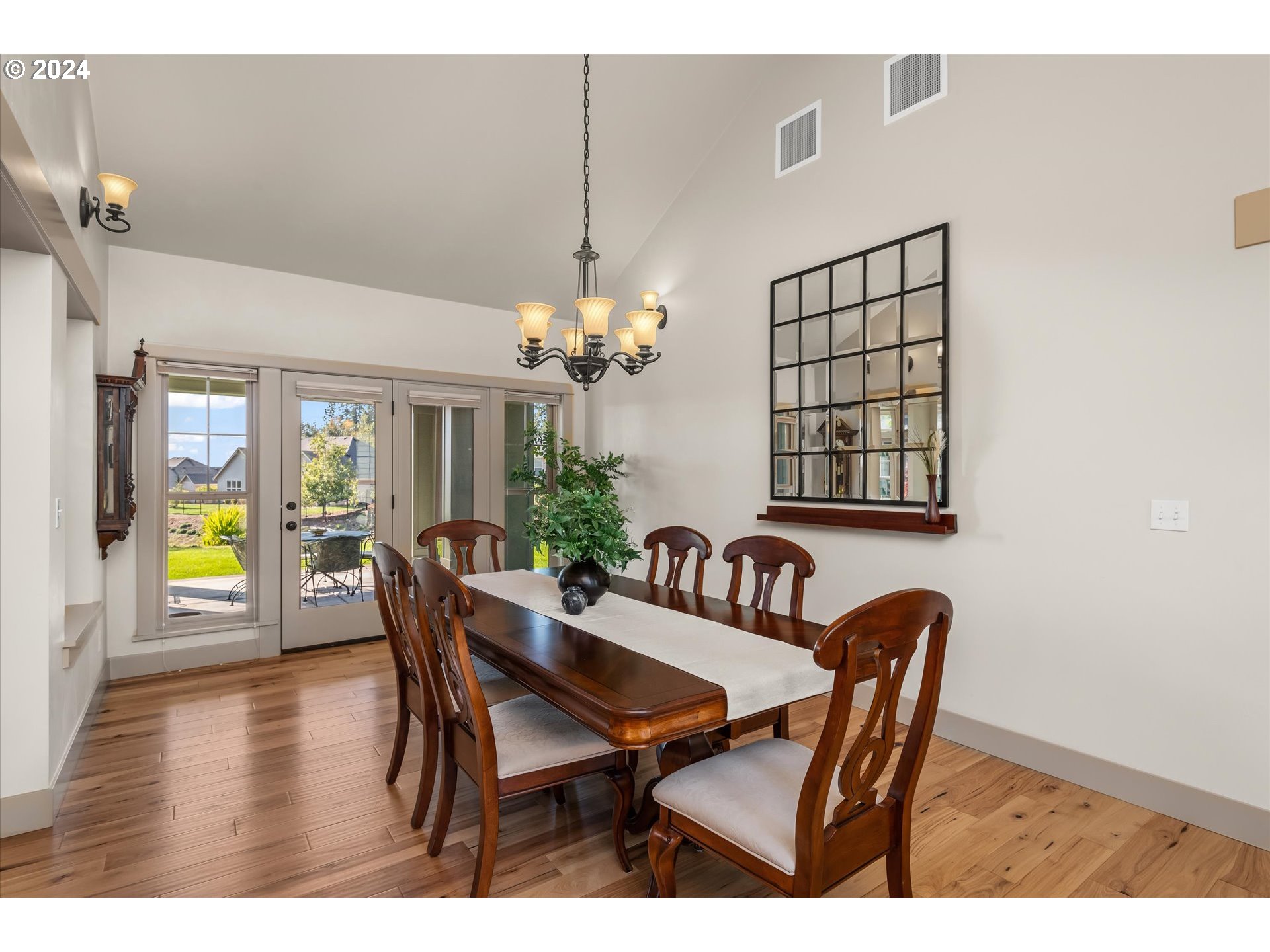 6019 Graystone Loop Springfield, OR 97478 - Photo 10 of 46 a view of a dining room with furniture and chandelier