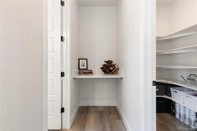 a view of workspace with wooden floor washer and dryer