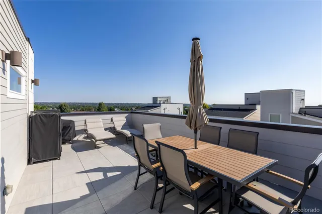 a view of a terrace with furniture