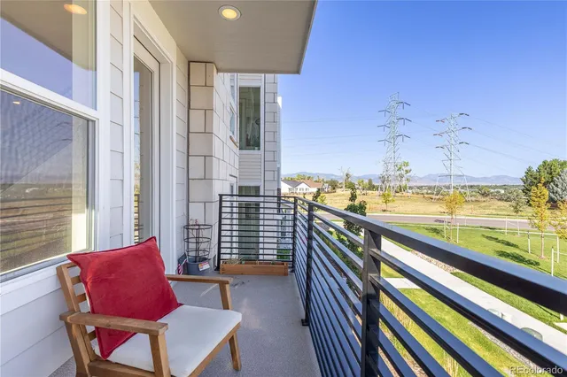 a view of swimming pool with seating space
