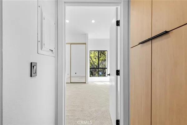 a view of an entryway with white walls