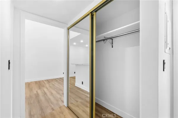 a bathroom with a glass shower door