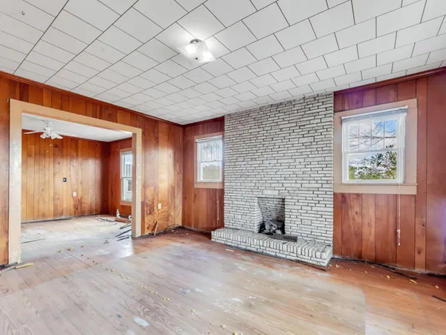 an empty room with windows