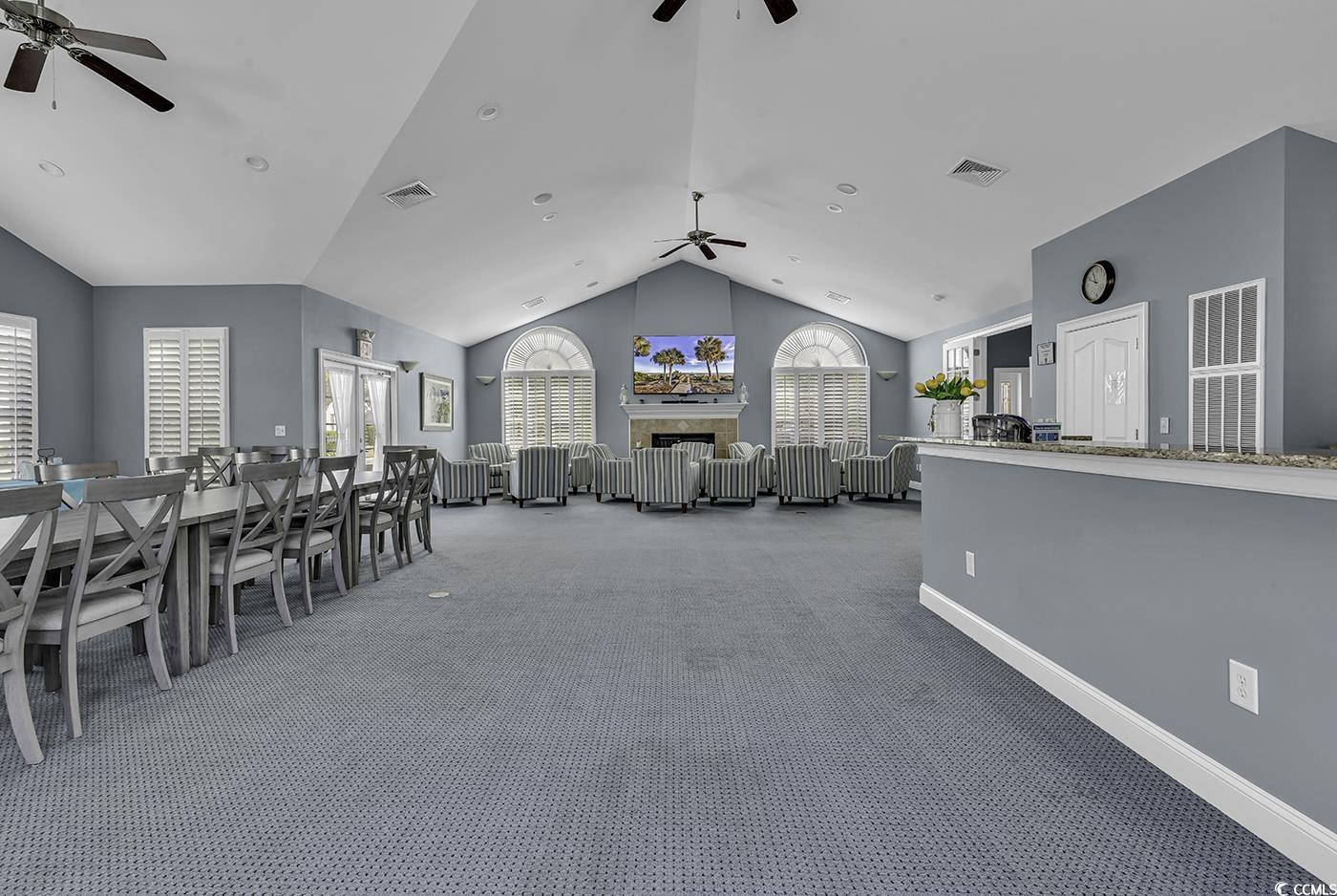109 Stonegate Boulevard, Unit 109 Murrells Inlet, SC 29576 - Photo 34 of 39 Unfurnished dining area with visible vents, vaulte