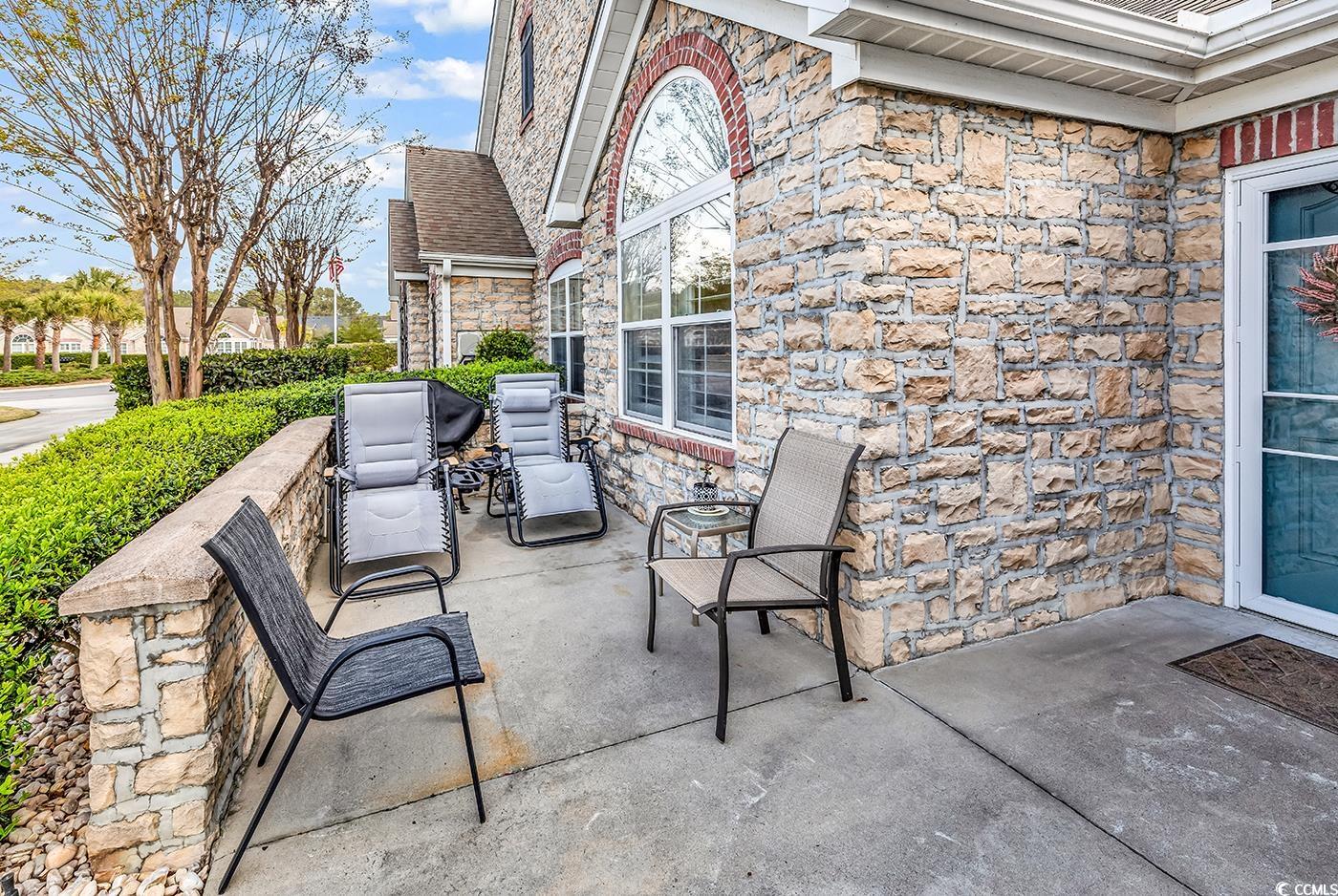 109 Stonegate Boulevard, Unit 109 Murrells Inlet, SC 29576 - Photo 6 of 39 View of patio