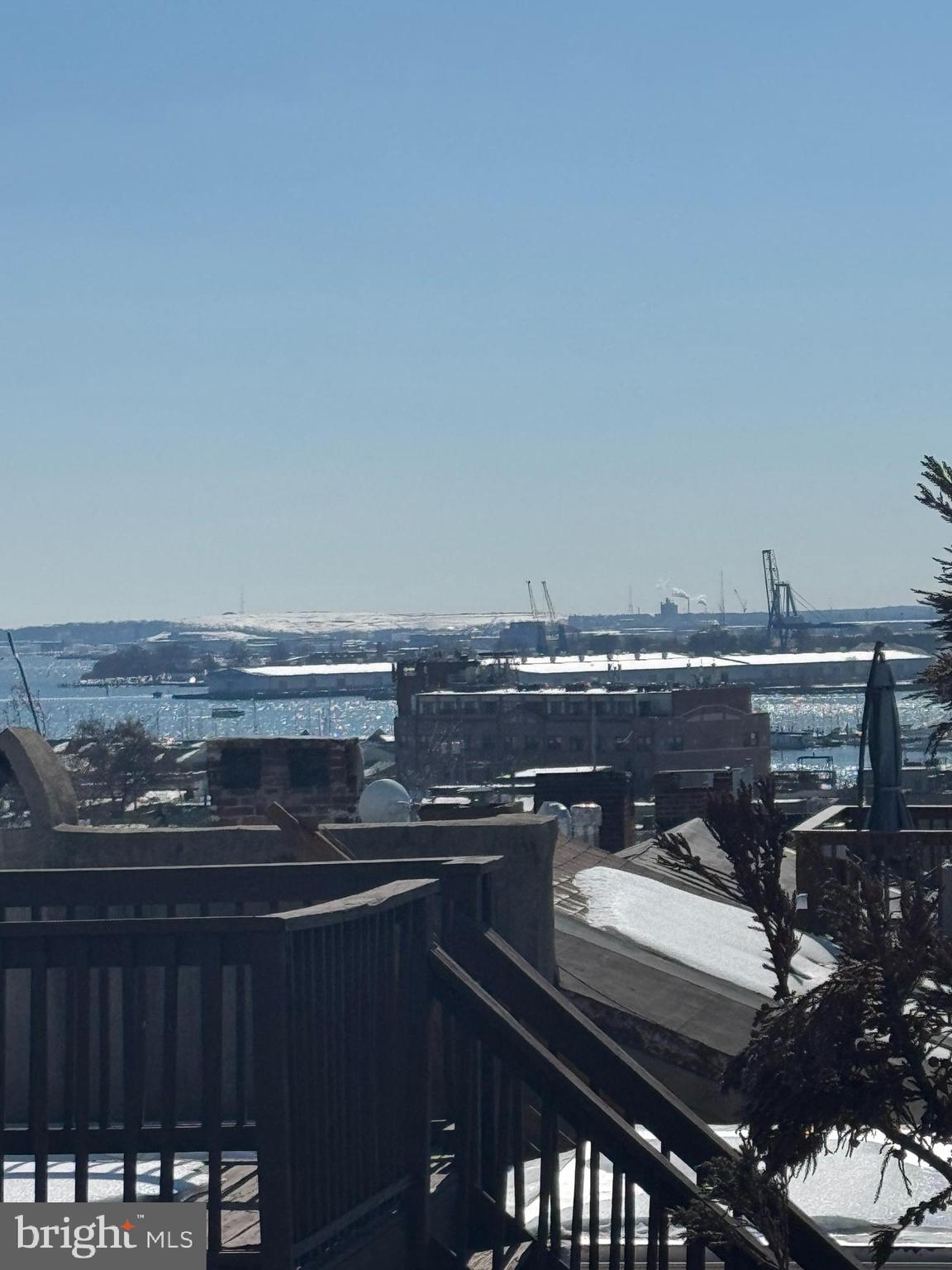 2033 East Pratt Street Baltimore, MD 21231 - Photo 15 of 61 a view of a roof deck with furniture