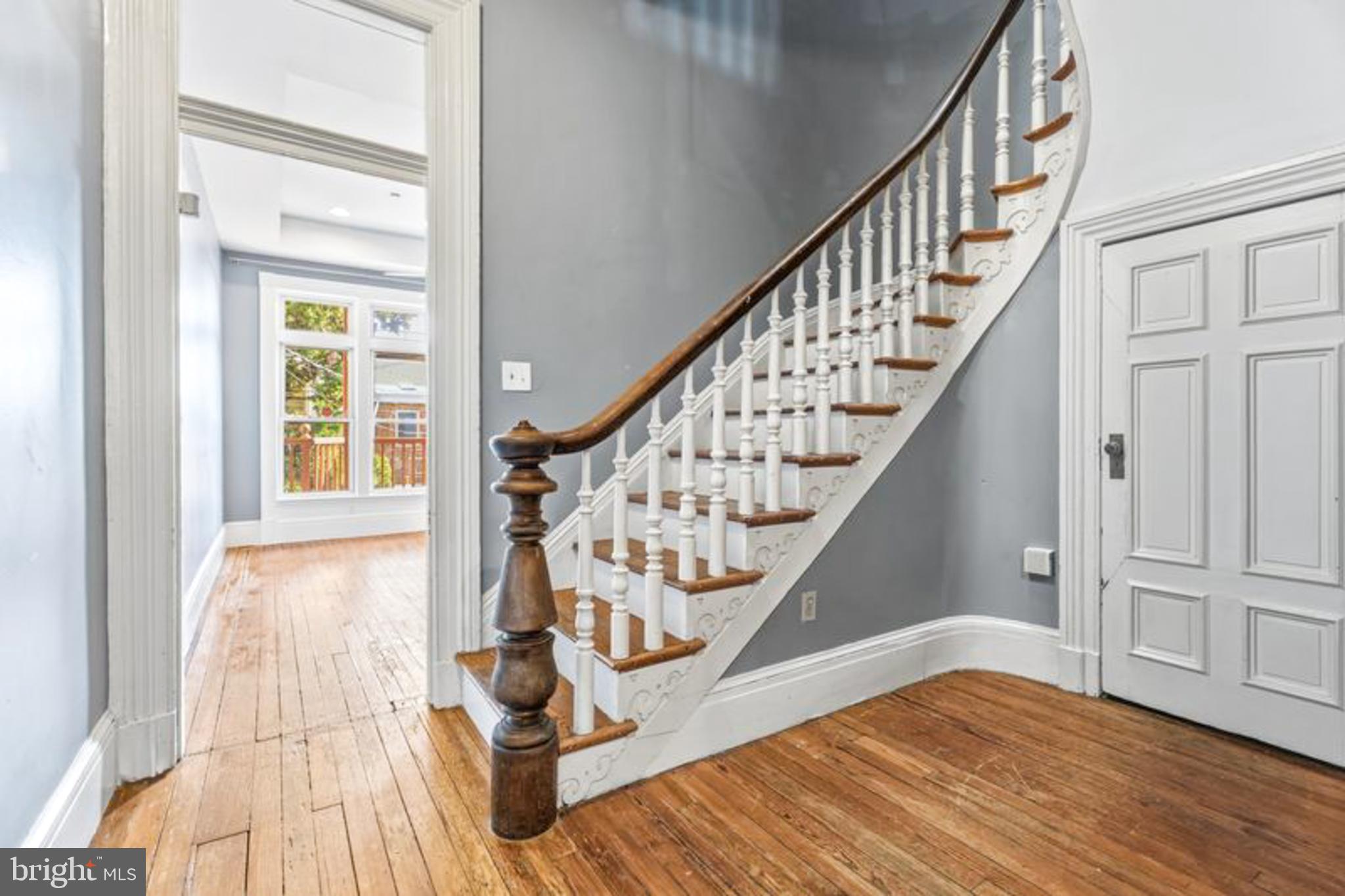 2033 East Pratt Street Baltimore, MD 21231 - Photo 17 of 61 a view of entryway with wooden floor and stairs
