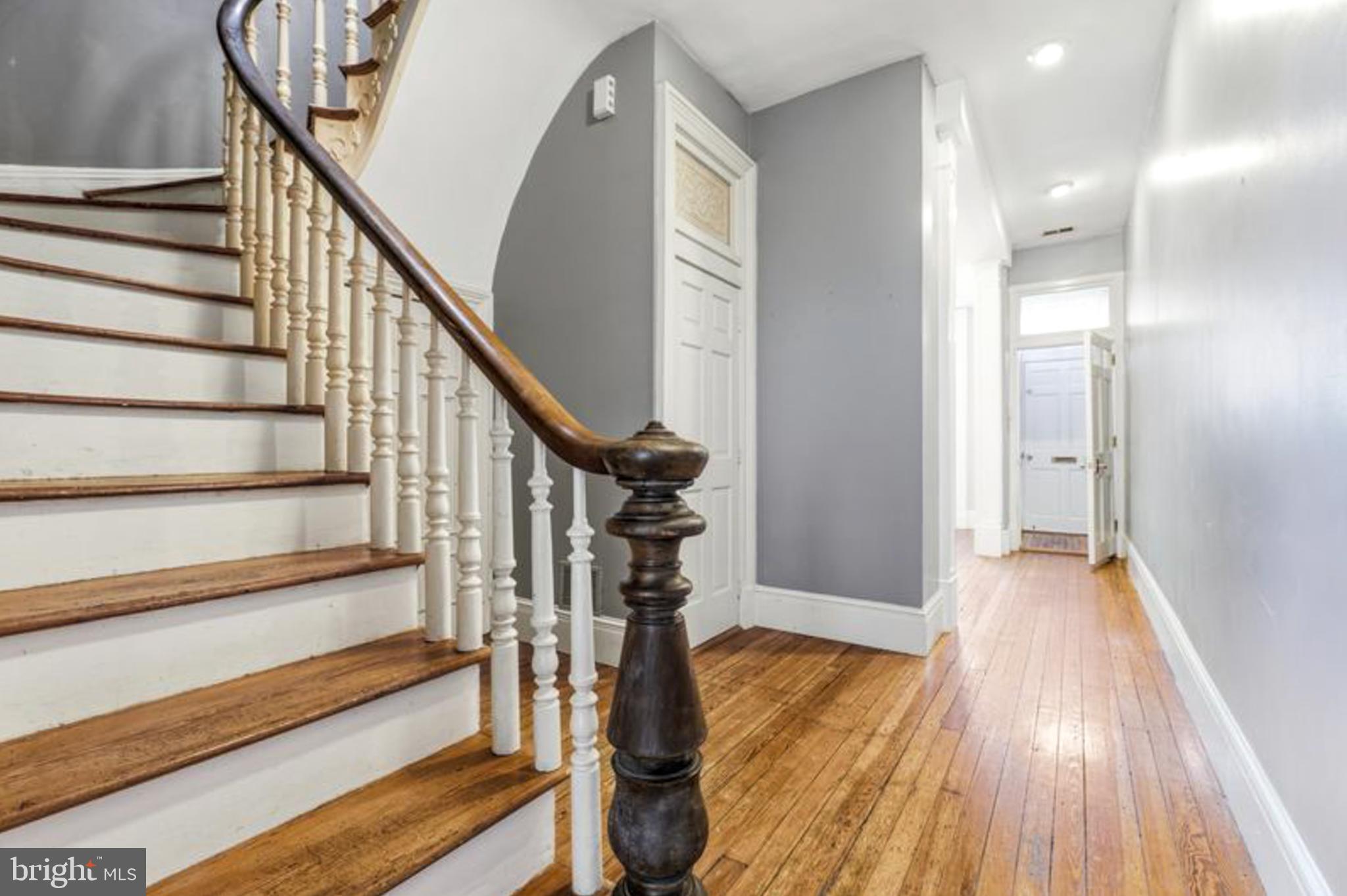 2033 East Pratt Street Baltimore, MD 21231 - Photo 18 of 61 a view of entryway with wooden floor and stairs