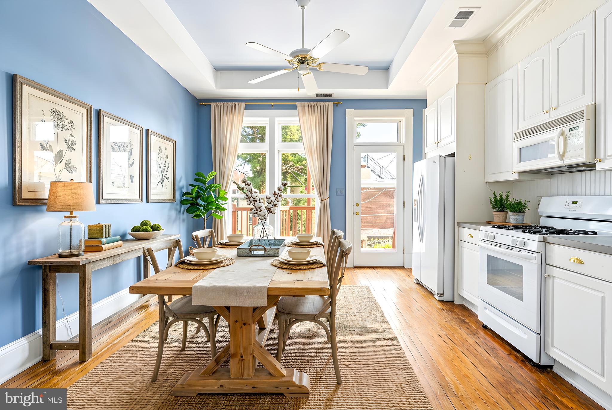 2033 East Pratt Street Baltimore, MD 21231 - Photo 21 of 61 a view of a dining room with furniture window and wooden floor