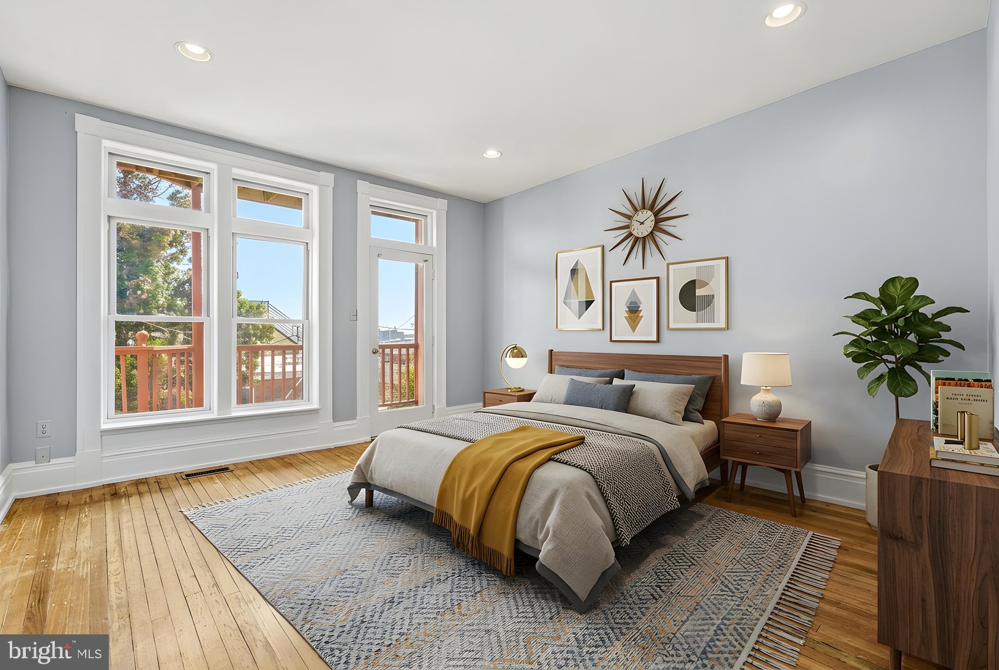 2033 East Pratt Street Baltimore, MD 21231 - Photo 28 of 61 a spacious bedroom with a large bed and a couch