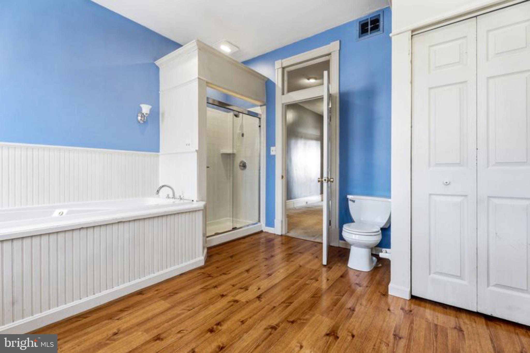 2033 East Pratt Street Baltimore, MD 21231 - Photo 33 of 61 a bathroom with a sink and a mirror