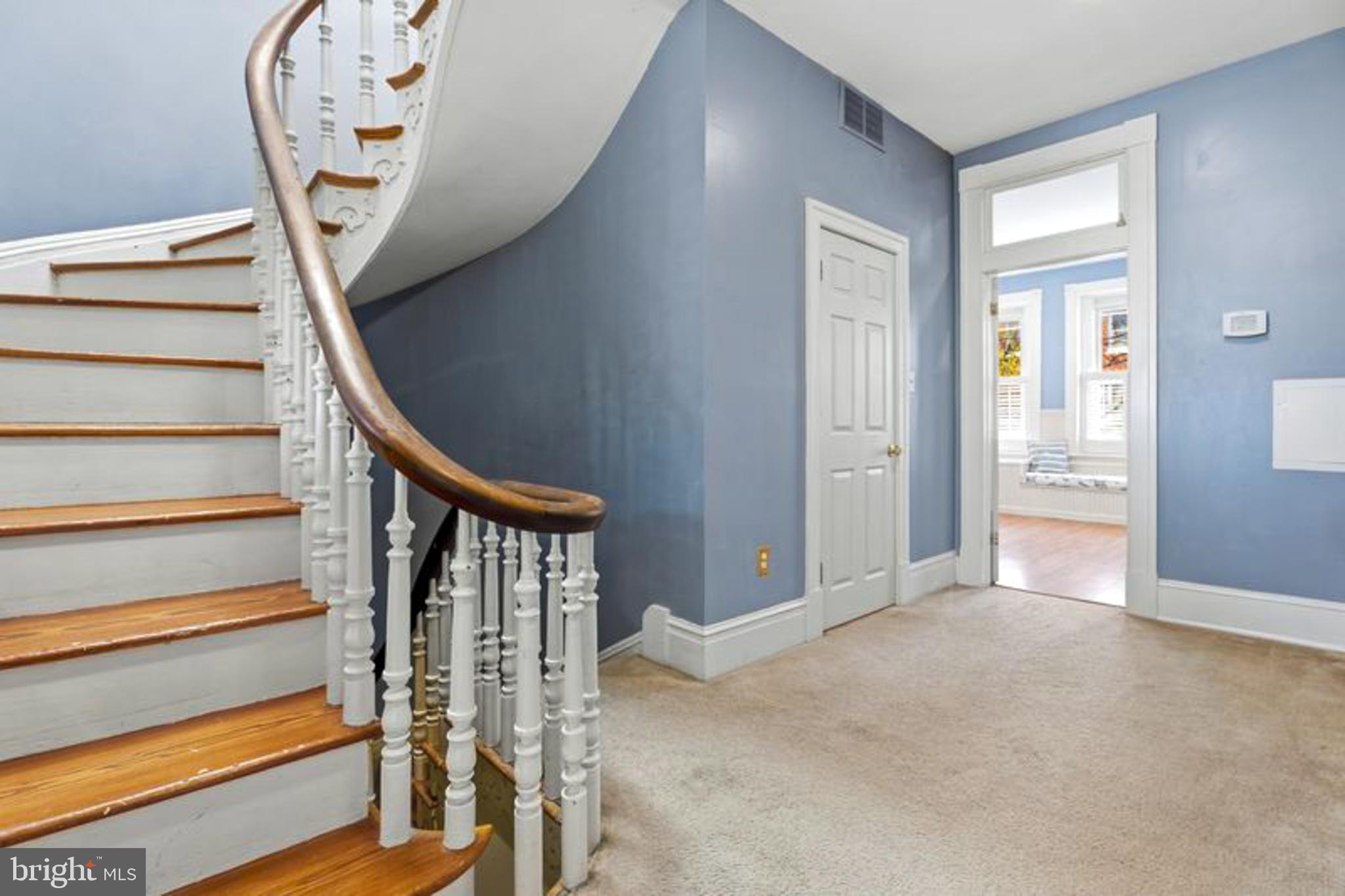 2033 East Pratt Street Baltimore, MD 21231 - Photo 35 of 61 a view of a hallway with wooden floor and entryway