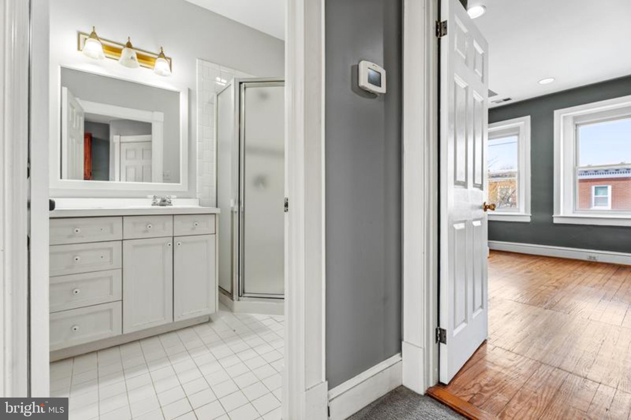 2033 East Pratt Street Baltimore, MD 21231 - Photo 41 of 61 a view of a kitchen from the hallway with windows