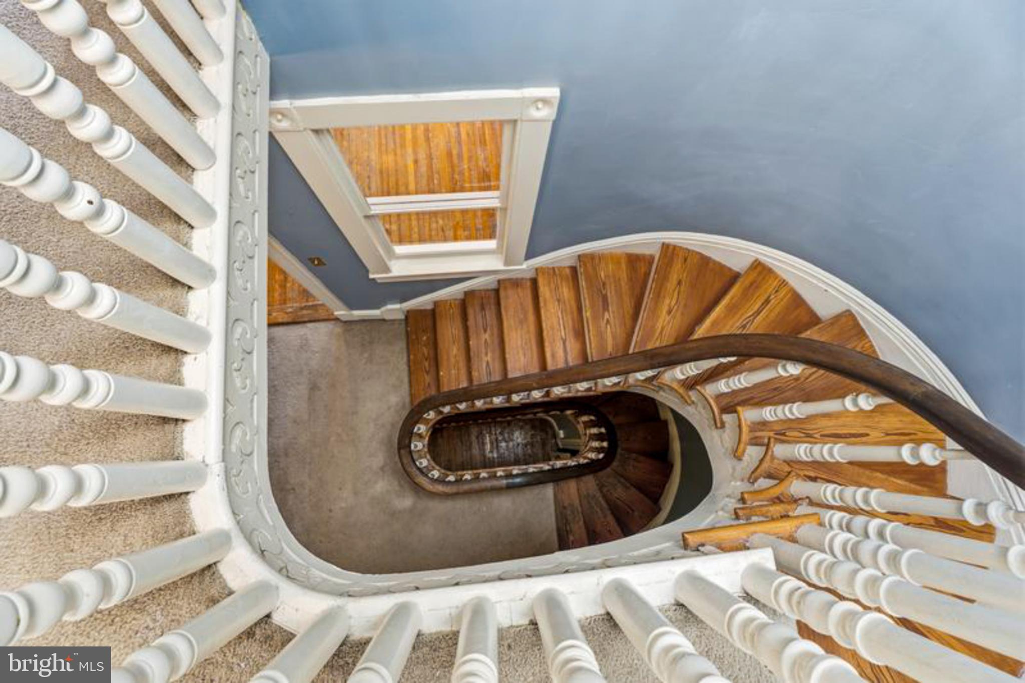 2033 East Pratt Street Baltimore, MD 21231 - Photo 43 of 61 a view of a door and chair in a room