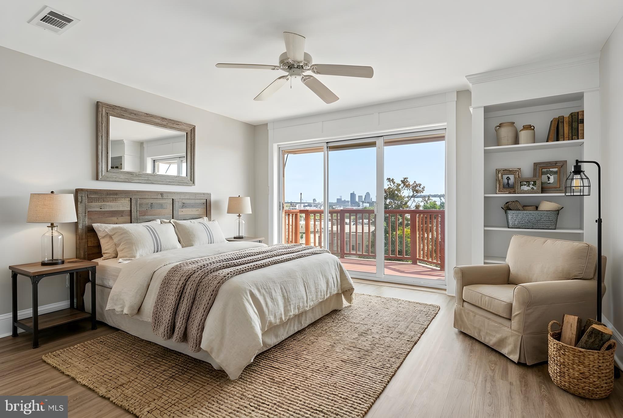 2033 East Pratt Street Baltimore, MD 21231 - Photo 47 of 61 a bedroom with a large bed couch and a window