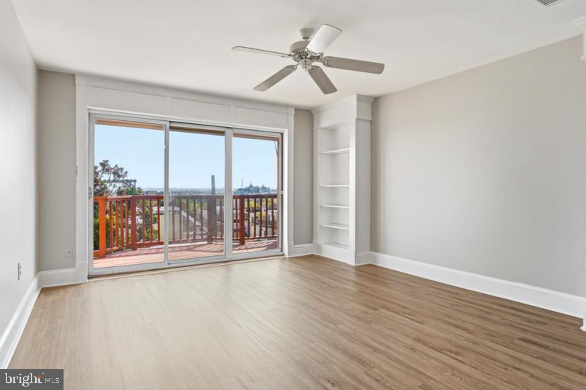 2033 East Pratt Street Baltimore, MD 21231 - Photo 48 of 61 a view of an empty room with a window