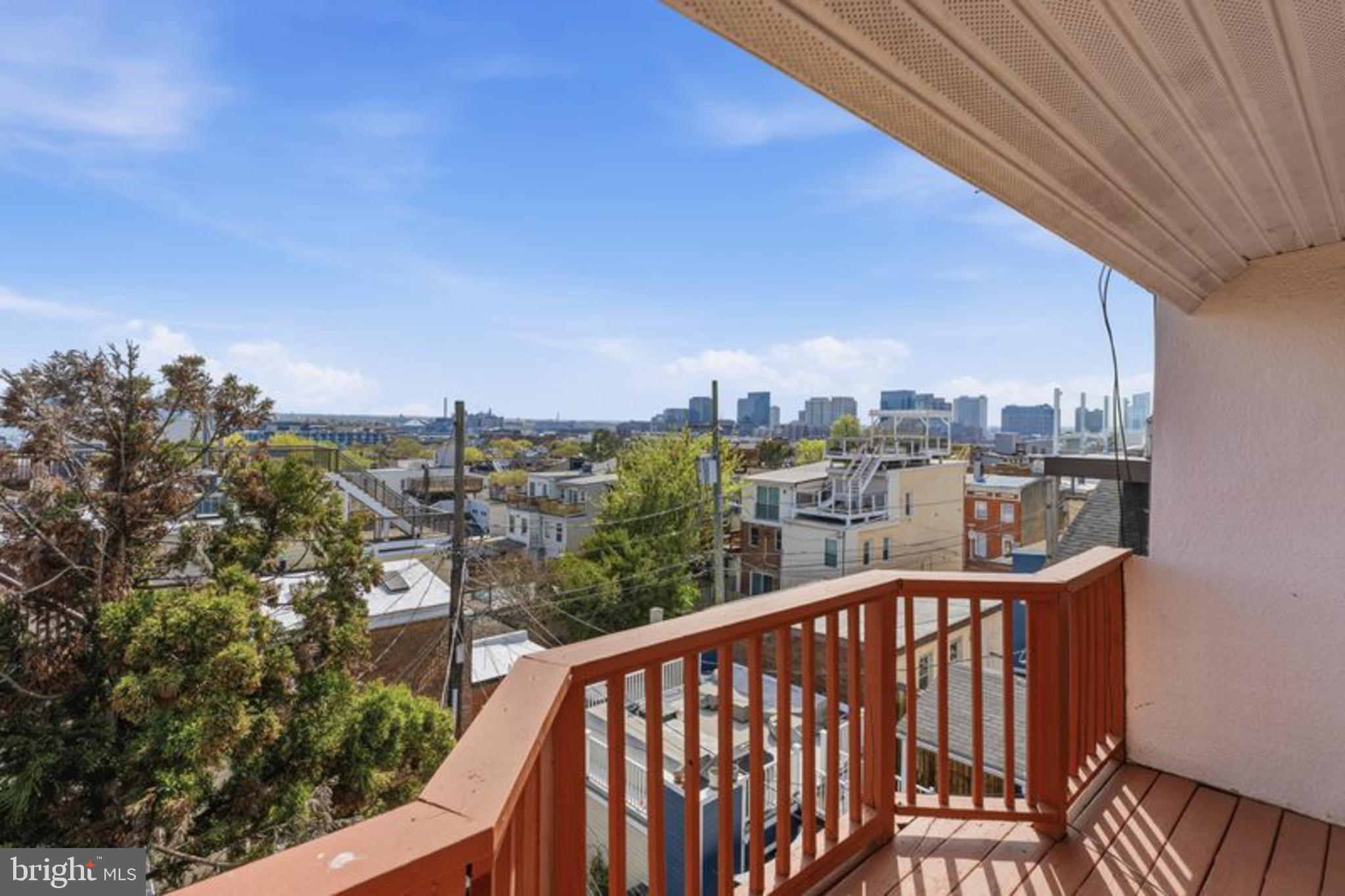 2033 East Pratt Street Baltimore, MD 21231 - Photo 49 of 61 a view of a balcony with city view