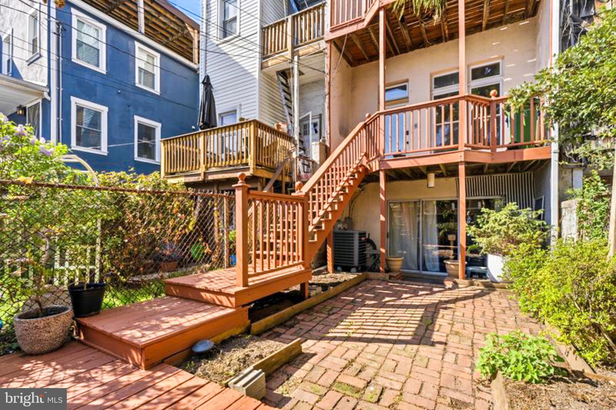 2033 East Pratt Street Baltimore, MD 21231 - Photo 52 of 61 a view of a brick building with many windows